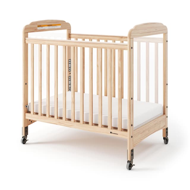 Foundations Serenity Compact Clearview Daycare Crib, Fixed Side, Durable Wood Construction, Adjustable Mattress Board, Clear End Panels. Includes 3” InfaPure Foam Mattress (Natural)