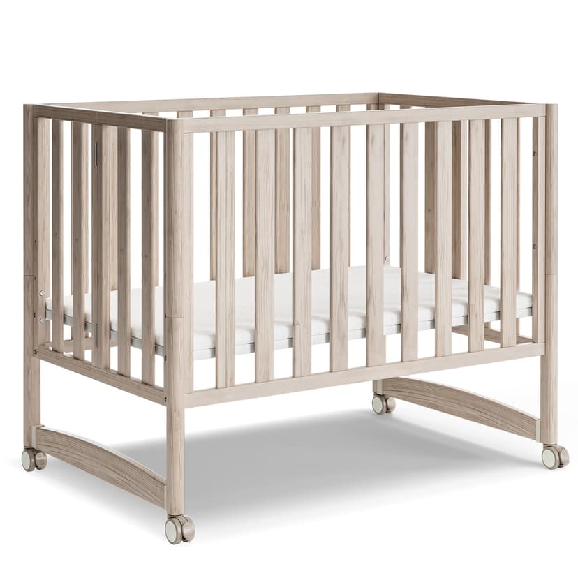 MAMAZING EvoNook 6-in-1 Convertible Mini Crib, 100% New Zealand Wood, Portable Mini Cribs with Wheels for Small Spaces, GREENGUARD Gold Certified, Washed Natural