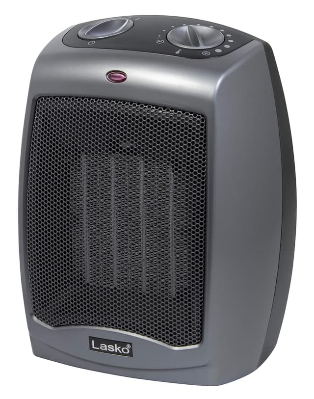 Lasko Portable Indoor Electric Ceramic Space Heater with Tip-Over Safety Switch, Overheat Protection and Thermostat, 2 Speeds, Safe for Home, 9.2 Inches, Dark Gray, 1500W, 754201