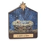 A CHILD IS BORN WOODEN CRECHE SITTER