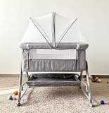 PRIMEORA Baby Crib with Canopy, Bassinet on Wheels with Storage Basket, Gray