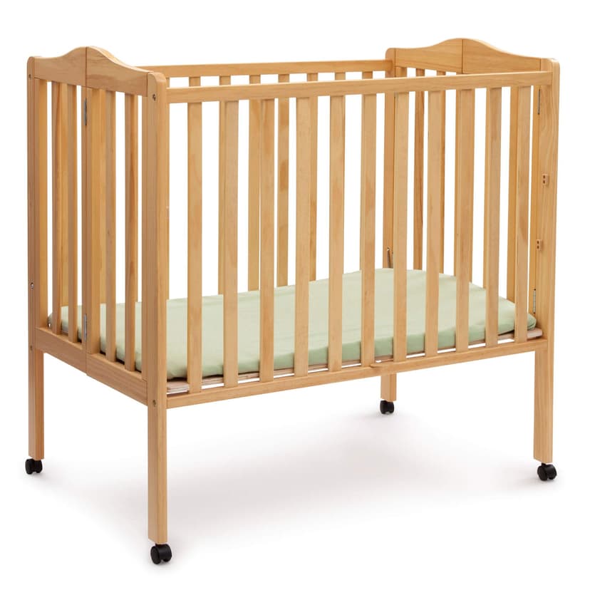 Delta Children Folding Portable Mini Baby Crib with 1.5-inch Mattress - Greenguard Gold Certified, Natural