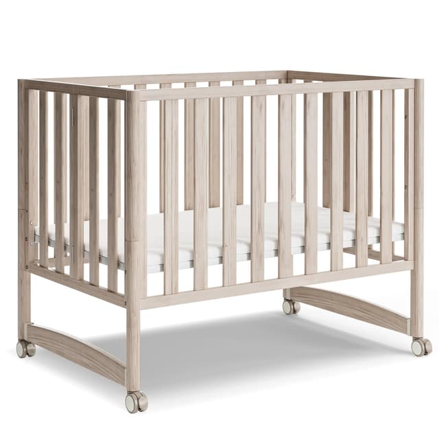 MAMAZING EvoNook 6-in-1 Convertible Mini Crib, 100% New Zealand Wood, Portable Mini Cribs with Wheels for Small Spaces, GREENGUARD Gold Certified, Washed Natural