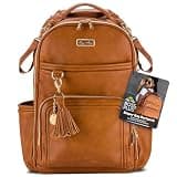 Itzy Ritzy Diaper Bag Backpack – Large Capacity Boss Plus Baby Backpack Diaper Bag Featuring 19 Pockets, Changing Pad, Stroller Clips, and Comfortable Straps (Cognac)