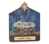 A CHILD IS BORN WOODEN CRECHE SITTER